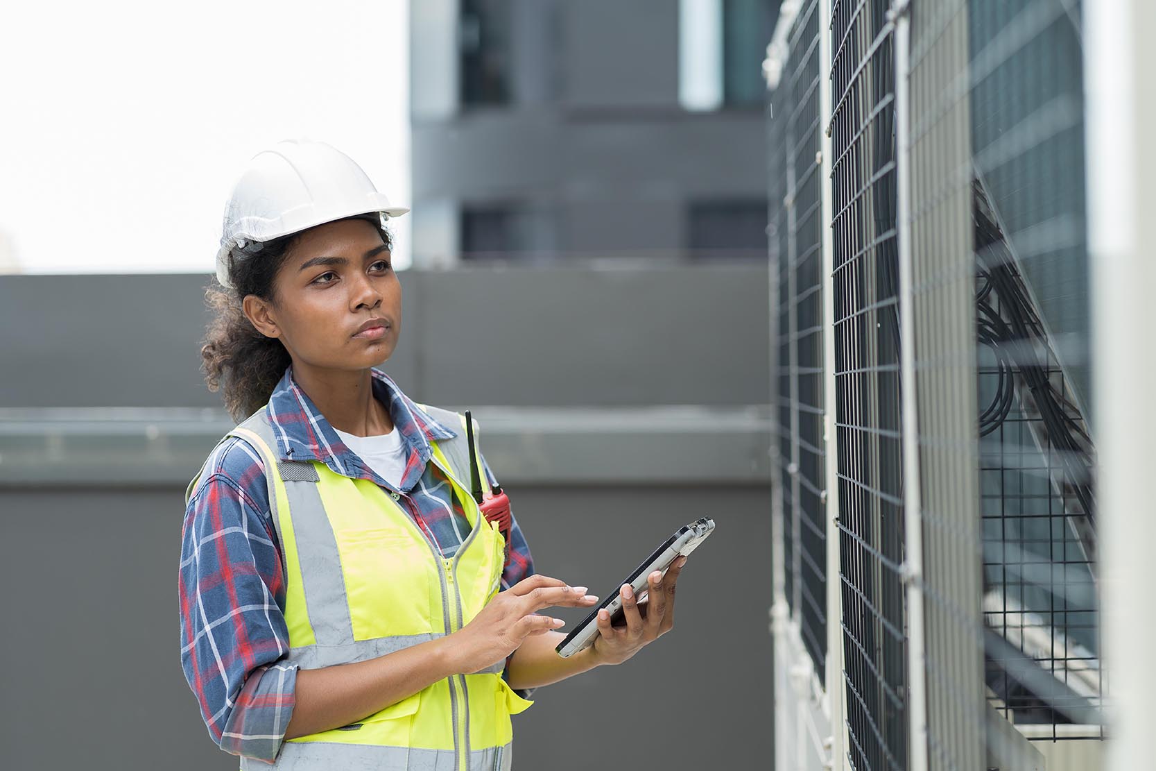 Female engineer or woman technician work with digital tablet for